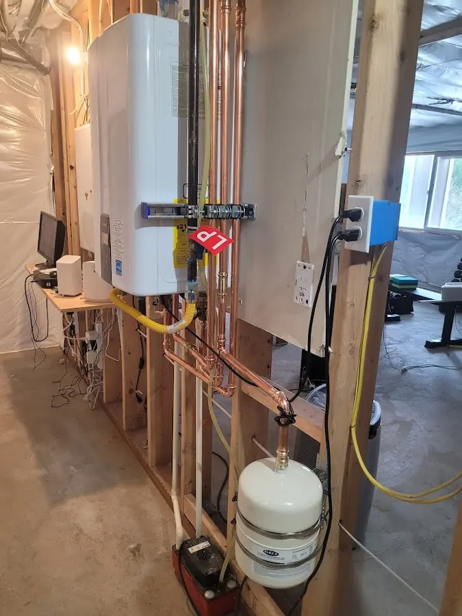 Licensed plumber repairing a kitchen sink in Ontelaunee