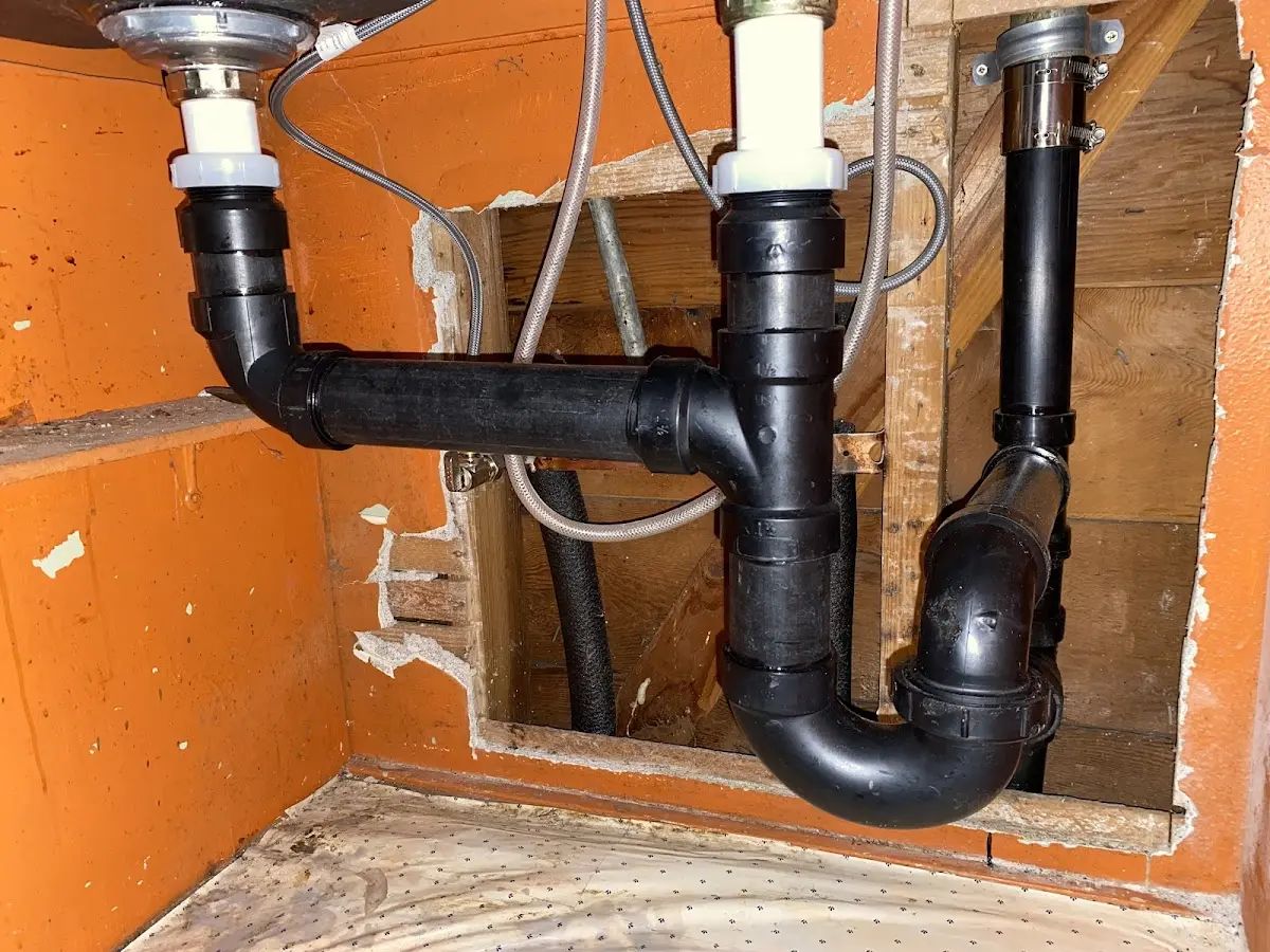 Professional Garbage Disposal Repair equipment and tools on the job in Ontelaunee